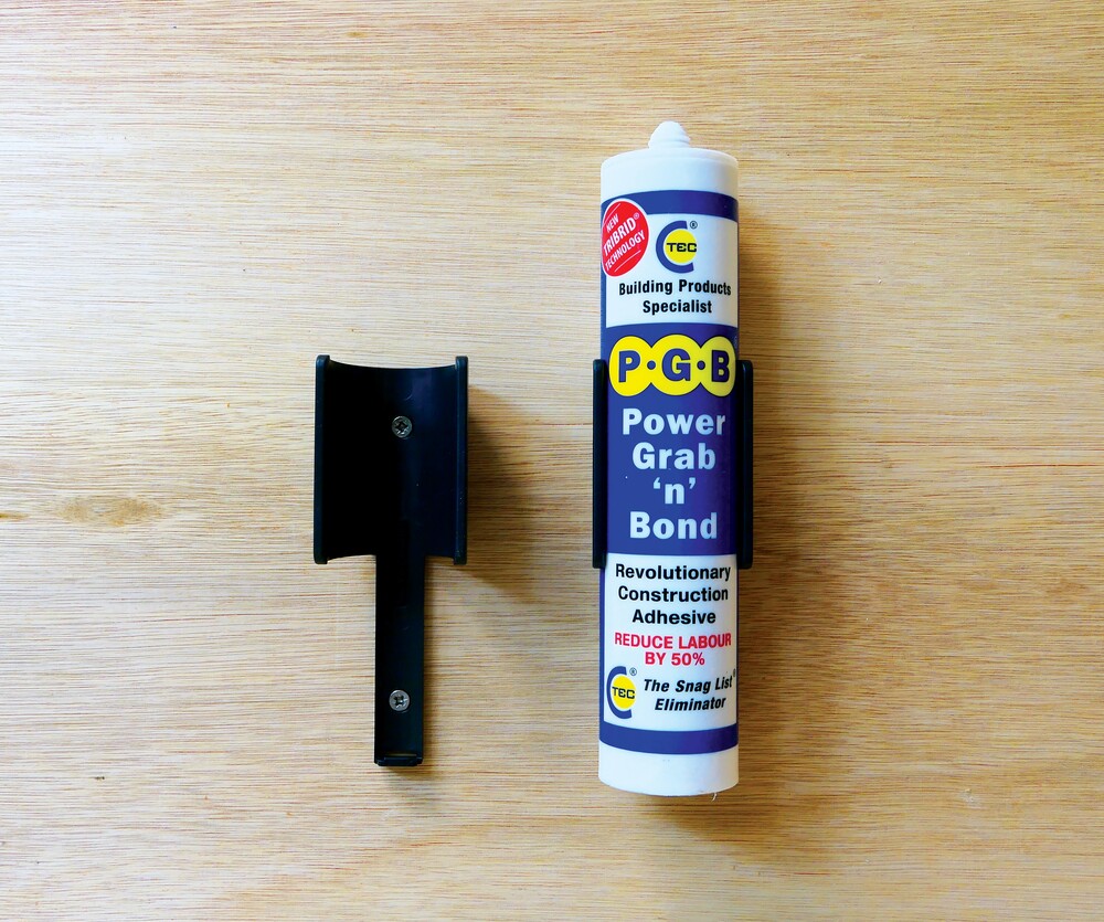 Haldari fyrir kíttistúpur